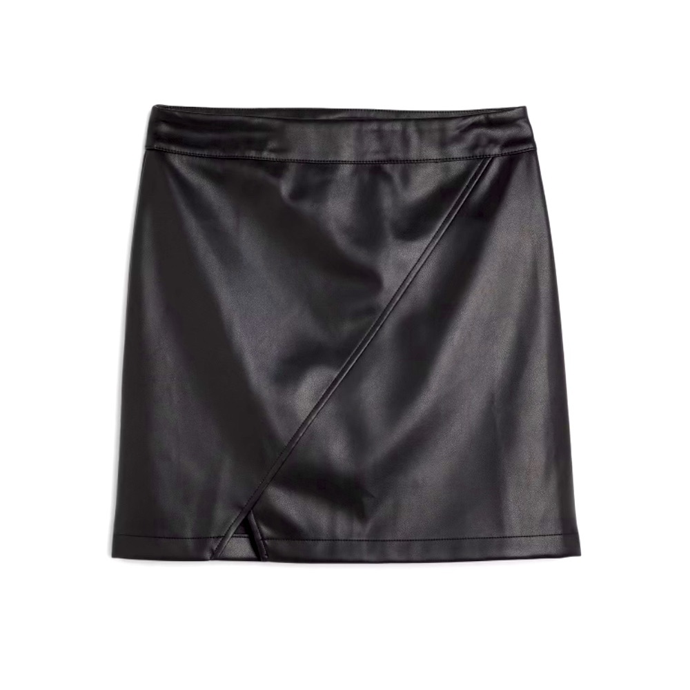Cute faux leather pull on mini skirt. Asymmetrical stitching and vent hem.
